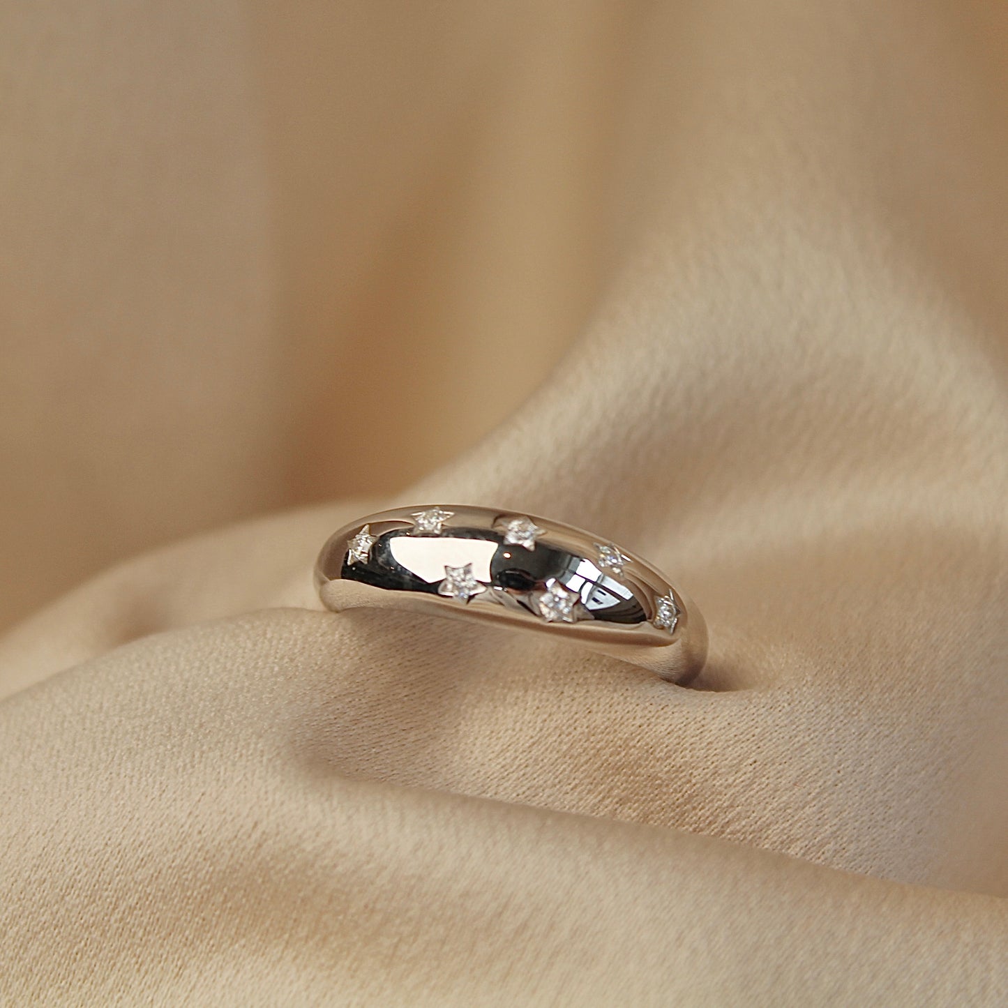Engraved Starburst Moissanite Ring