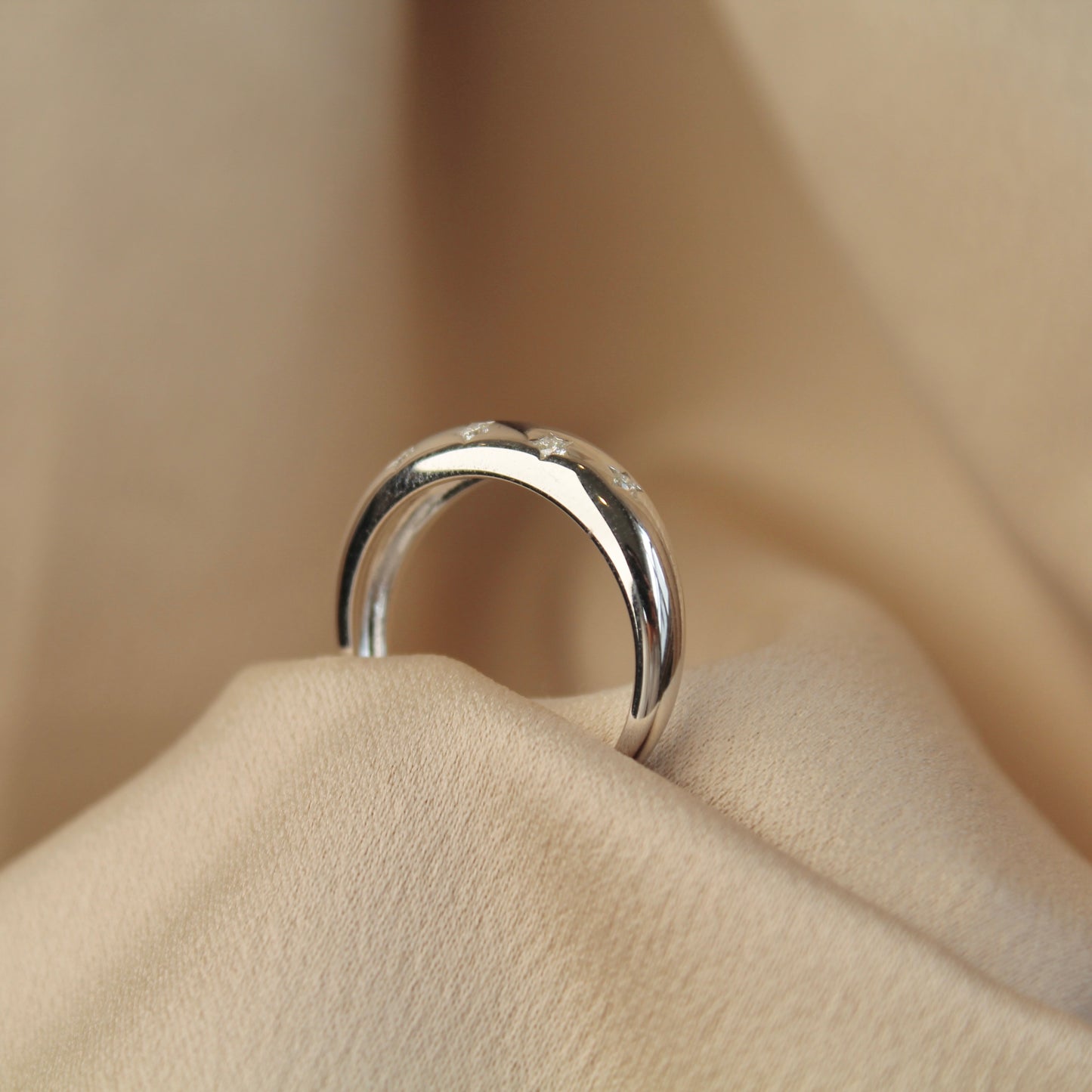 Engraved Starburst Moissanite Ring