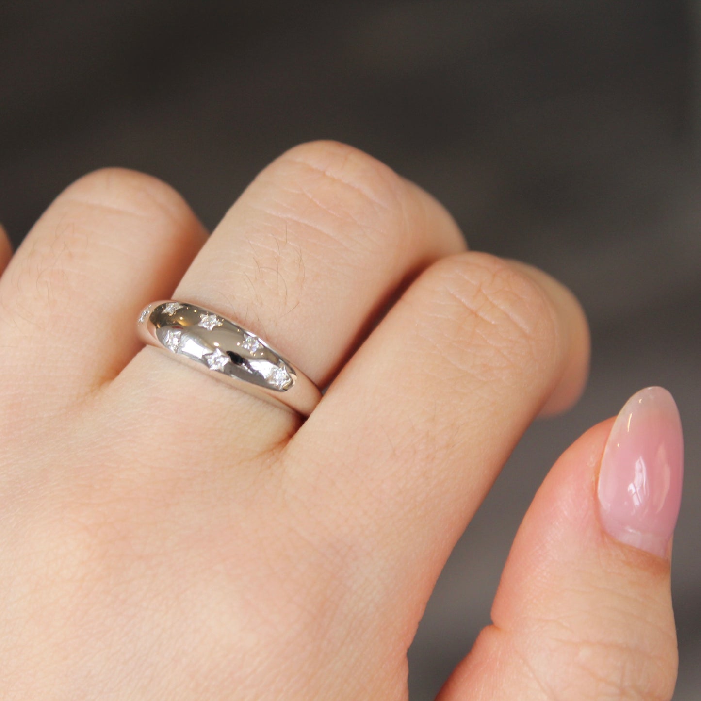 Engraved Starburst Moissanite Ring