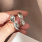 Twisted Mirror Finish Earrings