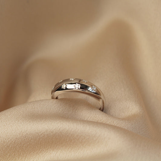 Engraved Starburst Moissanite Ring